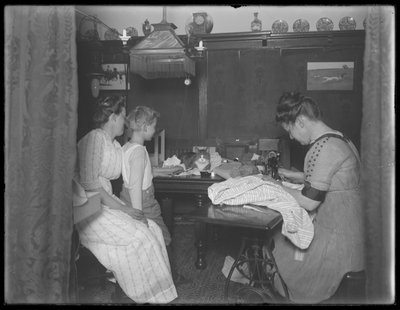Ethel Gray Magaw Hassler, William Gray Hassler, Harriet E. Hassler and Reddy in the Dining Area of 150 Vermilyea Avenue, Apartment 44, New York City by William Davis Hassler